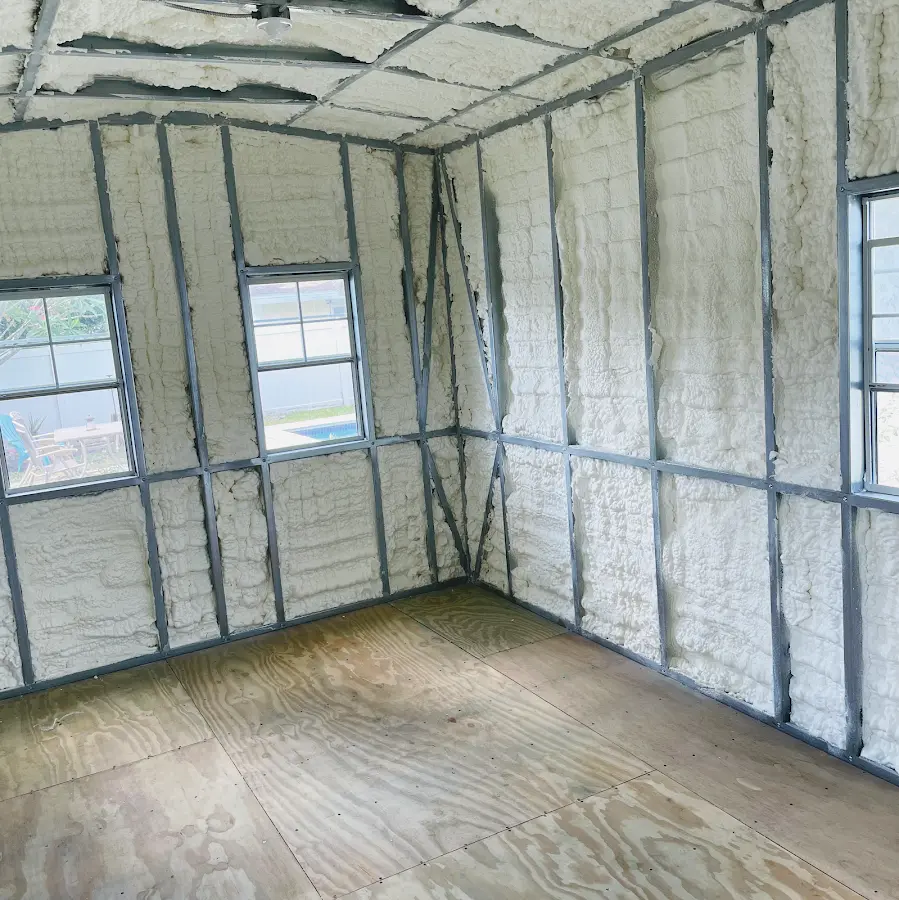 Closed-cell spray foam insulation applied to wall cavities in a residential project in Fort Myers